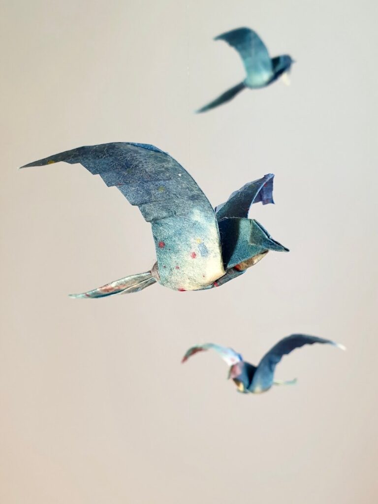 Blue and white origami birds