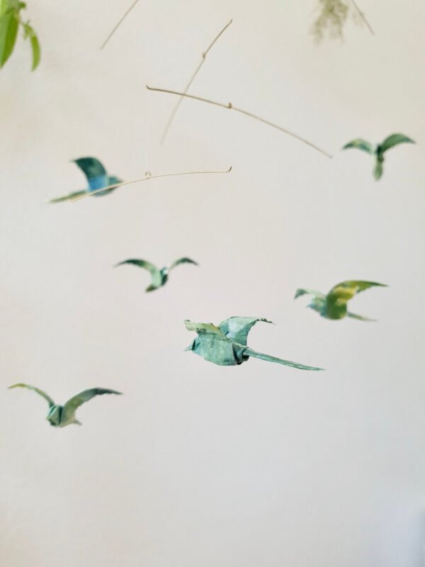 A hanging mobile with origami birds