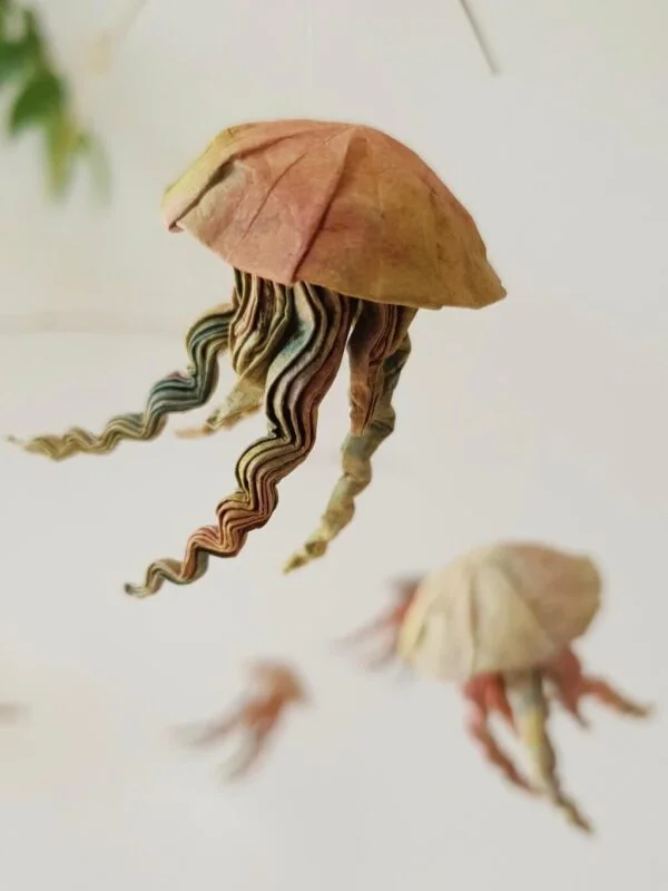 A hanging mobile with 7 origami jellyfish