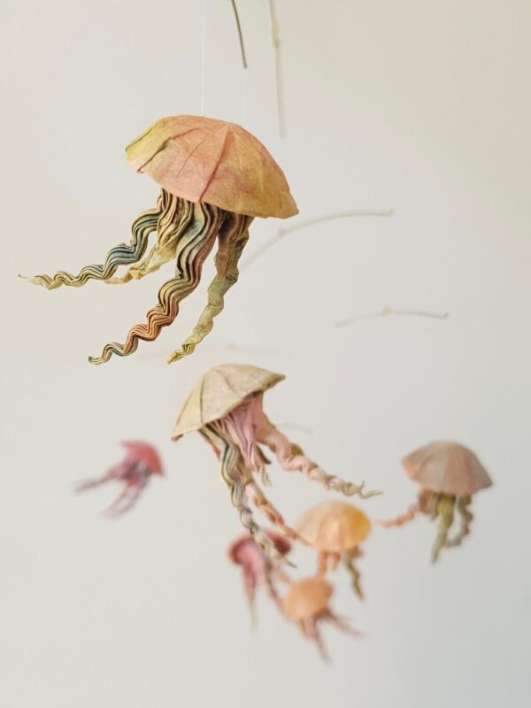 A hanging mobile with 7 origami jellyfish