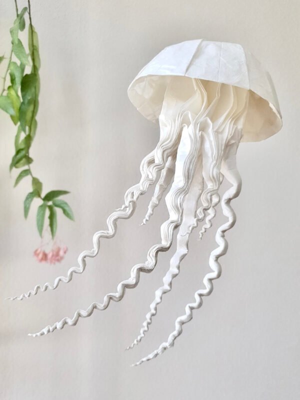A large white origami jellyfish
