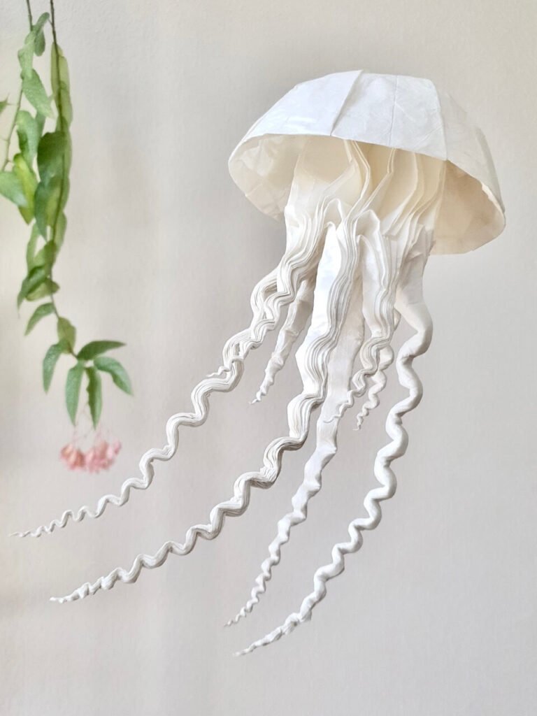 A large white origami jellyfish