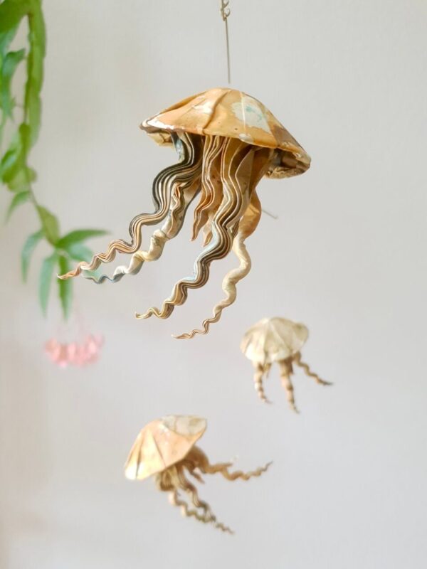 A hanging mobile with 3 origami jellyfish