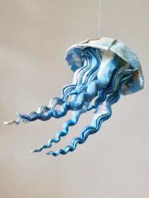 A blue and white origami jellyfish
