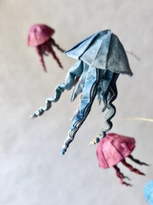 A blue origami jellyfish