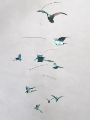 Hanging mobile with 9 cerulean and white origami birds