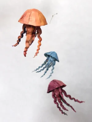 A hanging mobile with 3 origami jellyfish